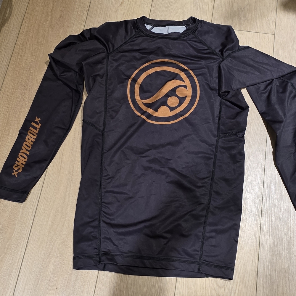 Black and Orange Or brown Long Sleeve Shirt (can't Tell)